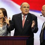 Rudy Giuliani gets ready for his speech with wife Judi at his side.